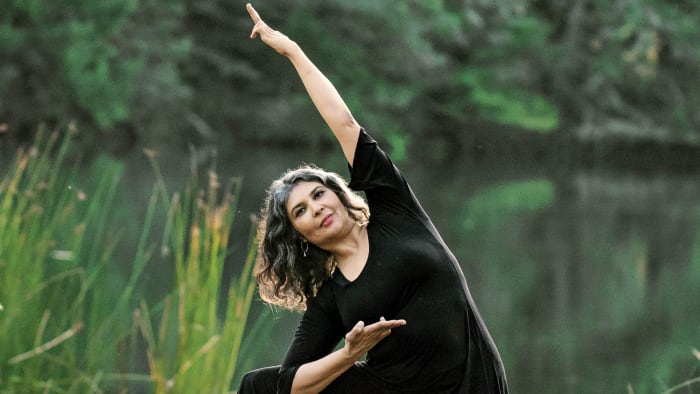 ARDHA PARIGHASANA WITH ARDHA PATAKA MUDRA