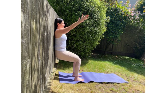 Stand with your back against a wall and step your feet forward so that your heels are under your knees. Bend your knees to 90 degrees and slide your bum down the wall. You can keep your hands in prayer at your chest or reach your arms toward the sky. Gaze straight ahead. Stay for 10 breaths. Place your hands on the wall for balance and straighten your legs to stand back up. Take a brief rest, like a layover, before repeating one more time.Benefits: Chair Pose gives us the opportunity to practice being uncomfortable, knowing it is a necessary aspect along the path to getting stronger. Think of it as our cramped airplane seat as we depart for our trip. The most challenging journeys often lead to the most beautiful destinations, such as a spectacular vista after a long hike or self-discovery after a difficult period. See also 5 Poses You Can Practice on a Flight